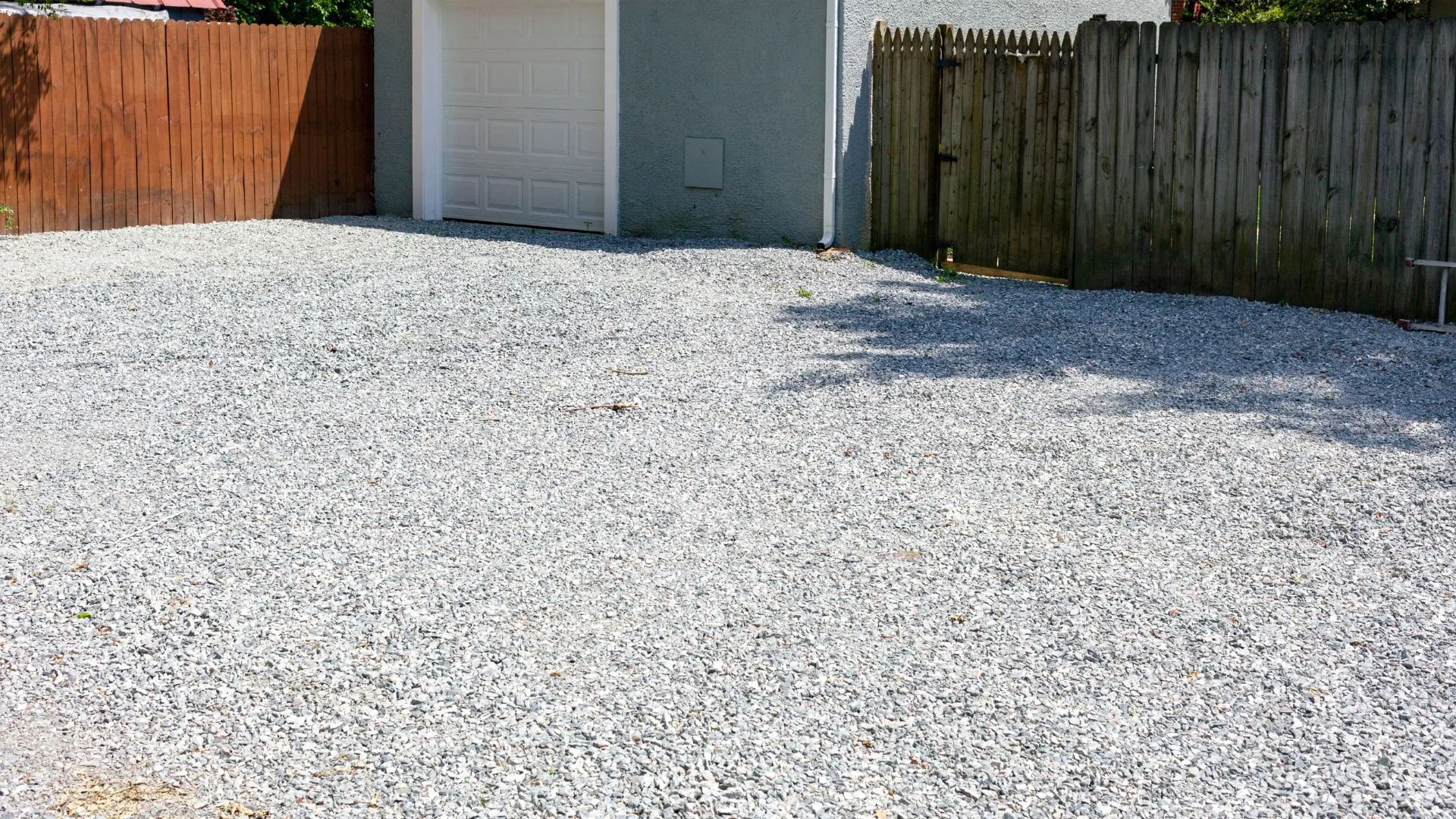 Residential property with a finished gravel parking pad in the Harrisburg area